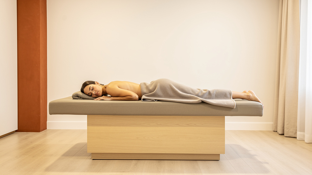 A session: draped on the table in a bright, calm room.